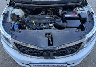 Подержанный автомобиль Kia Rio Sedan 2016 года (14 фото)