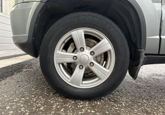 Подержанный автомобиль Chevrolet Niva 2012 года (15 фото)