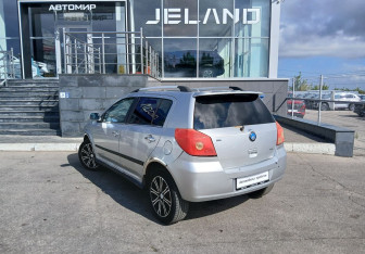 Подержанный автомобиль Geely MK Cross 2014 года (7 фото)
