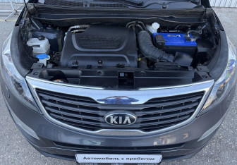 Подержанный автомобиль Kia Sportage 2013 года (14 фото)