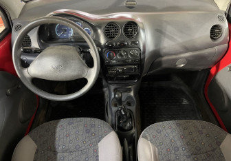 Подержанный автомобиль Daewoo Matiz 2012 года (10 фото)