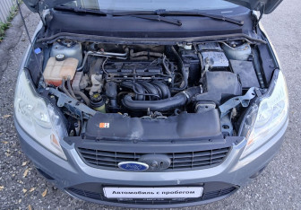 Подержанный автомобиль Ford Focus Sedan 2010 года (13 фото)