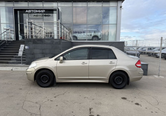 Подержанный автомобиль Nissan Tiida Sedan 2012 года (8 фото)