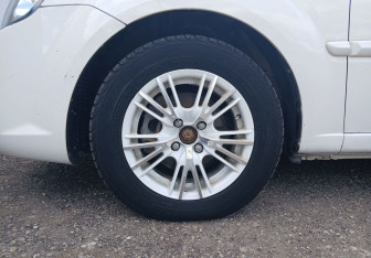 Подержанный автомобиль Kia Rio Sedan 2011 года (14 фото)