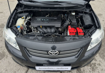Подержанный автомобиль Toyota Corolla Sedan 2008 года (14 фото)