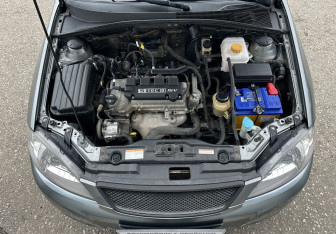 Подержанный автомобиль Daewoo Gentra Sedan 2014 года (13 фото)
