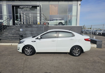 Подержанный автомобиль Kia Rio Sedan 2013 года (8 фото)