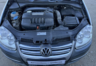 Подержанный автомобиль Volkswagen Jetta Sedan 2009 года (14 фото)