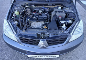 Подержанный автомобиль Mitsubishi Lancer Wagon 2008 года (13 фото)
