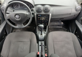 Подержанный автомобиль Nissan Almera Sedan 2014 года (10 фото)