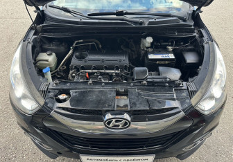 Подержанный автомобиль Hyundai ix35 2012 года (13 фото)
