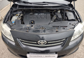 Подержанный автомобиль Toyota Corolla Sedan 2006 года (14 фото)