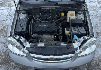 Подержанный автомобиль Chevrolet Lacetti Sedan 2012 года (14 фото)