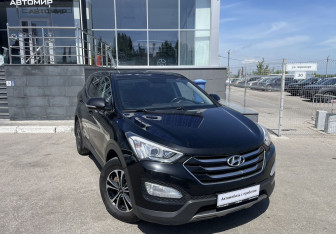 Подержанный автомобиль Hyundai Santa Fe 2014 года (3 фото)