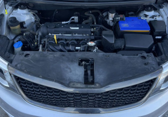 Подержанный автомобиль Kia Rio Sedan 2016 года (13 фото)