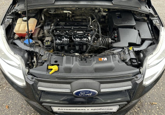 Подержанный автомобиль Ford Focus Hatchback 2014 года (13 фото)