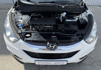 Подержанный автомобиль Hyundai ix35 2012 года (14 фото)
