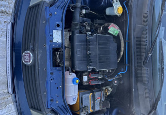 Подержанный автомобиль Fiat Albea 2010 года (13 фото)