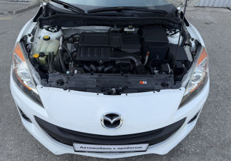 Подержанный автомобиль Mazda 3 Sedan 2013 года (14 фото)