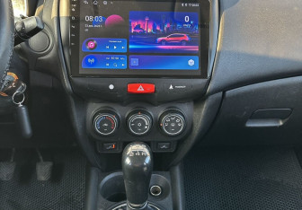 Подержанный автомобиль Mitsubishi ASX 2014 года (11 фото)