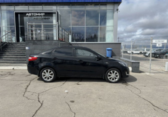 Подержанный автомобиль Kia Rio Sedan 2014 года (4 фото)