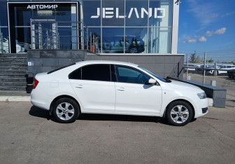 Подержанный автомобиль Skoda Rapid Liftback 2015 года (4 фото)