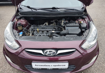 Подержанный автомобиль Hyundai Solaris Hatchback 2011 года (13 фото)