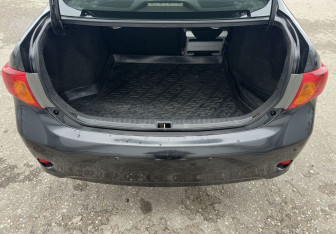 Подержанный автомобиль Toyota Corolla Sedan 2008 года (13 фото)
