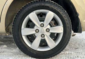 Подержанный автомобиль Kia Rio Sedan 2010 года (14 фото)