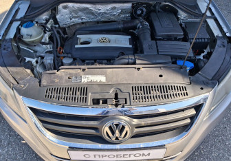 Подержанный автомобиль Volkswagen Tiguan 2010 года (14 фото)