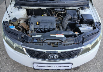 Подержанный автомобиль Kia Cerato Sedan 2011 года (14 фото)