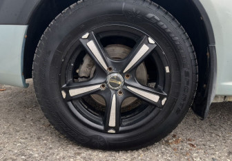 Подержанный автомобиль Renault Logan Sedan 2007 года (14 фото)