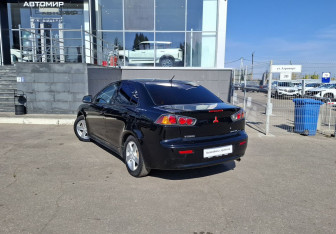 Подержанный автомобиль Mitsubishi Lancer Sedan 2012 года (7 фото)