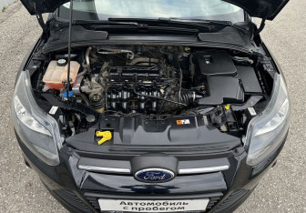 Подержанный автомобиль Ford Focus Sedan 2013 года (14 фото)