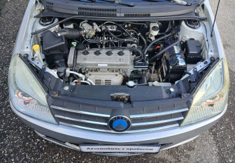 Подержанный автомобиль Geely MK Cross 2014 года (13 фото)