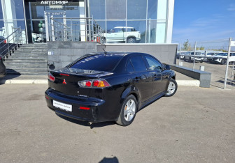 Подержанный автомобиль Mitsubishi Lancer Sedan 2012 года (5 фото)
