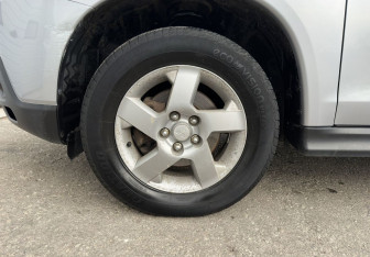 Подержанный автомобиль Mitsubishi ASX 2011 года (14 фото)