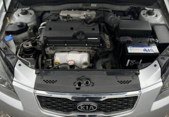 Подержанный автомобиль Kia Rio Hatchback 2010 года (13 фото)