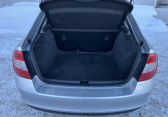 Подержанный автомобиль Skoda Rapid Liftback 2014 года (15 фото)