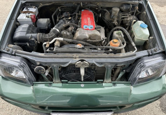 Подержанный автомобиль Suzuki Jimny 2008 года (13 фото)