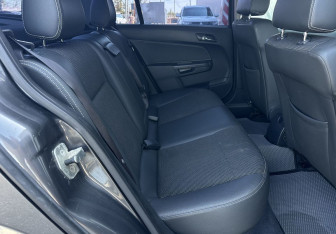 Подержанный автомобиль Opel Astra Sedan 2011 года (12 фото)