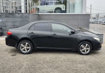 Подержанный автомобиль Toyota Corolla Sedan 2006 года (4 фото)