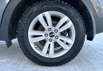 Подержанный автомобиль Kia Sportage 2017 года (14 фото)