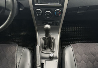 Подержанный автомобиль Toyota Corolla Sedan 2008 года (11 фото)