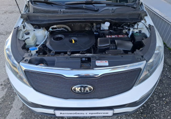 Подержанный автомобиль Kia Sportage 2014 года (14 фото)