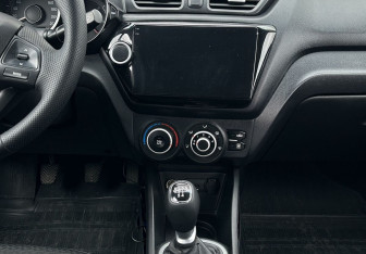 Подержанный автомобиль Kia Rio Sedan 2014 года (11 фото)