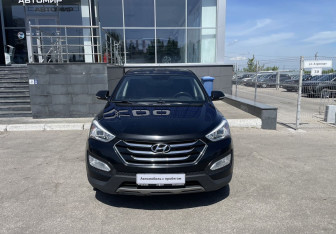 Подержанный автомобиль Hyundai Santa Fe 2014 года (2 фото)