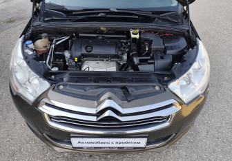 Подержанный автомобиль Citroen C4 Sedan 2013 года (13 фото)