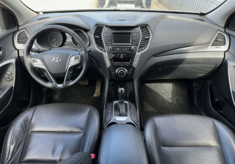 Подержанный автомобиль Hyundai Santa Fe 2015 года (10 фото)