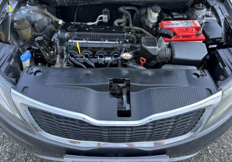 Подержанный автомобиль Kia Rio Sedan 2013 года (13 фото)